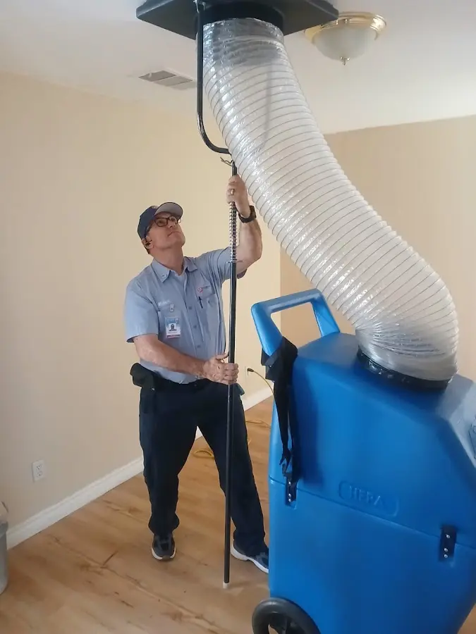 Mini Split Installation technician using HEPA equipment in Grand Haven