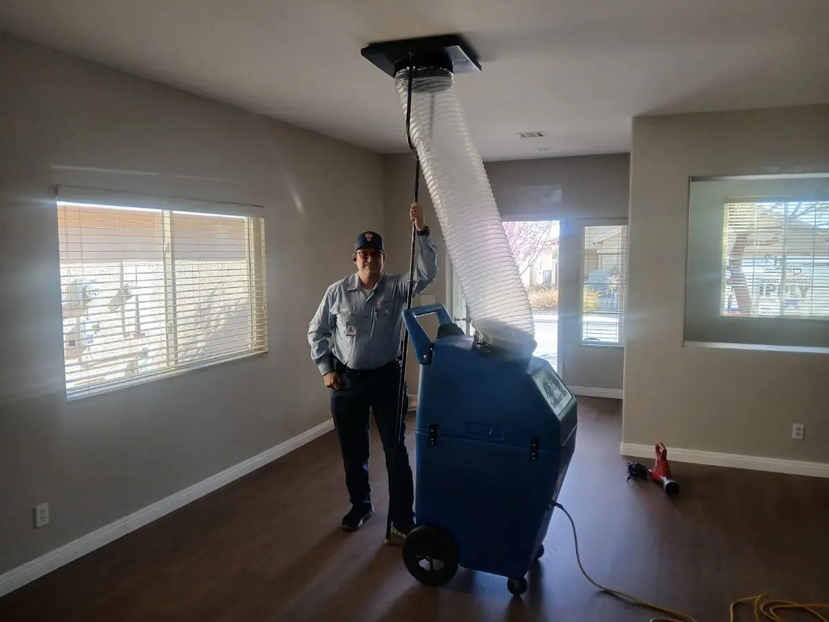 Professional Dryer Vent Cleaning work inside a Grand Haven home